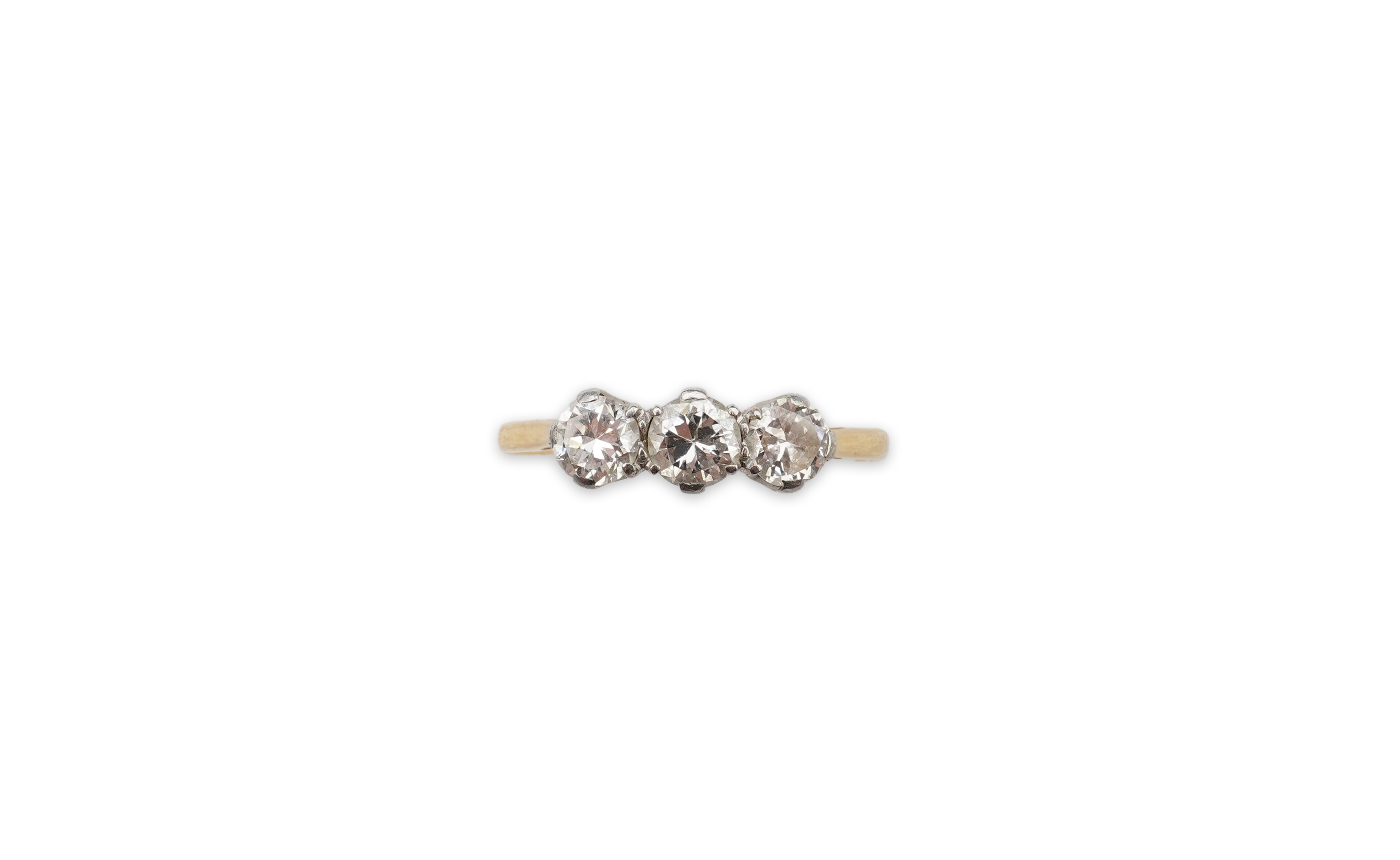 A diamond three-stone ring, set with three circular-cut diamonds totalling approximately 0.50 carats, mounted in gold, size O, stamped 18CT, gross weight approximately 2 grams